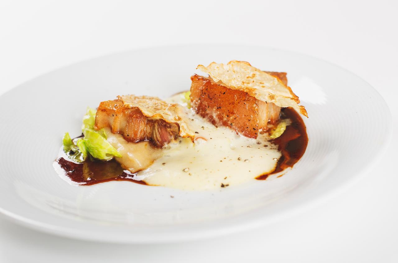 Retro Riverside Wellness Resort Karlovy Vary Extérieur photo A prepared dish of monkfish